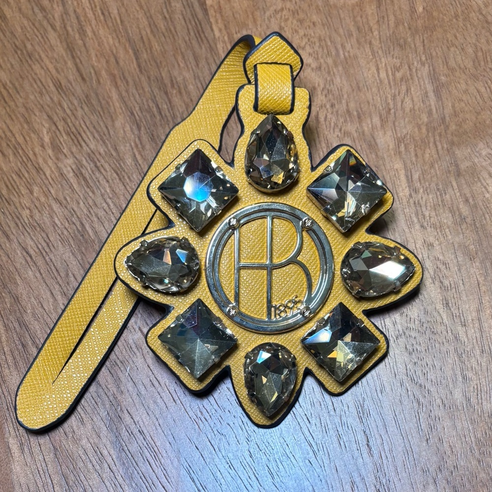 Henri Bendel West 57th Mustard Yellow Bag Charm